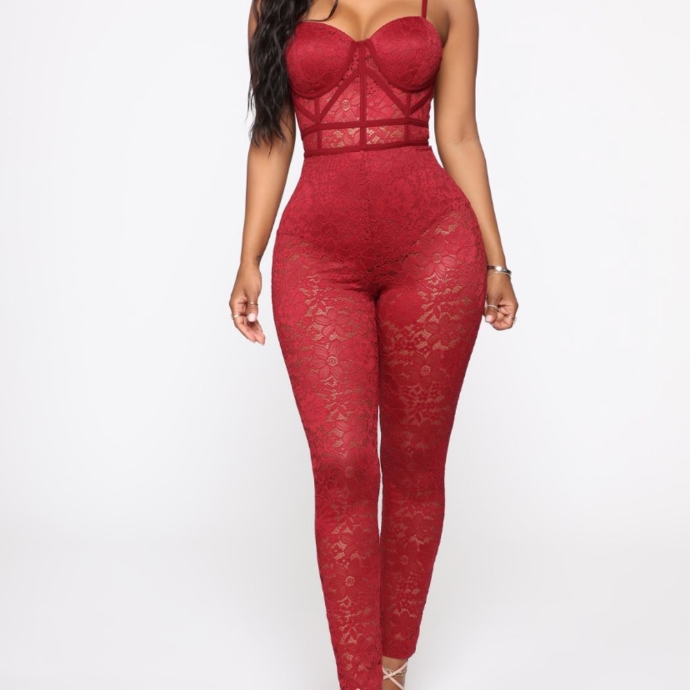 NWOT Beautifully crafted form fitting jumpsuit.